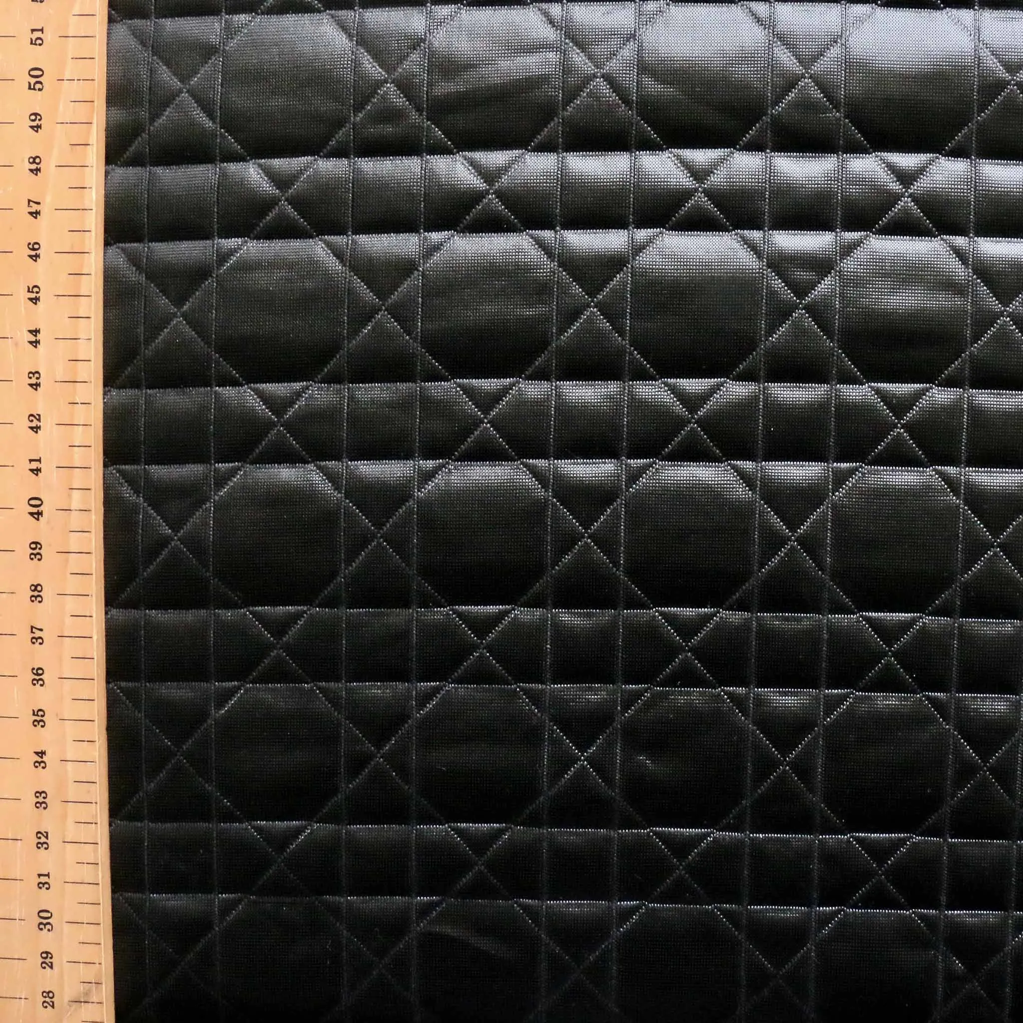 Quilted Jersey Fabric - Black geometric pattern